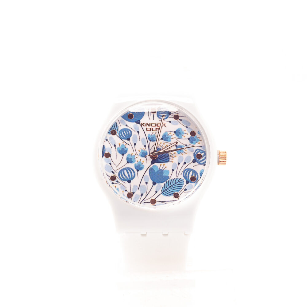 RELOJ KNOCK OUT DE FLORES Y MALLA CELESTE PASTEL DE GOMA