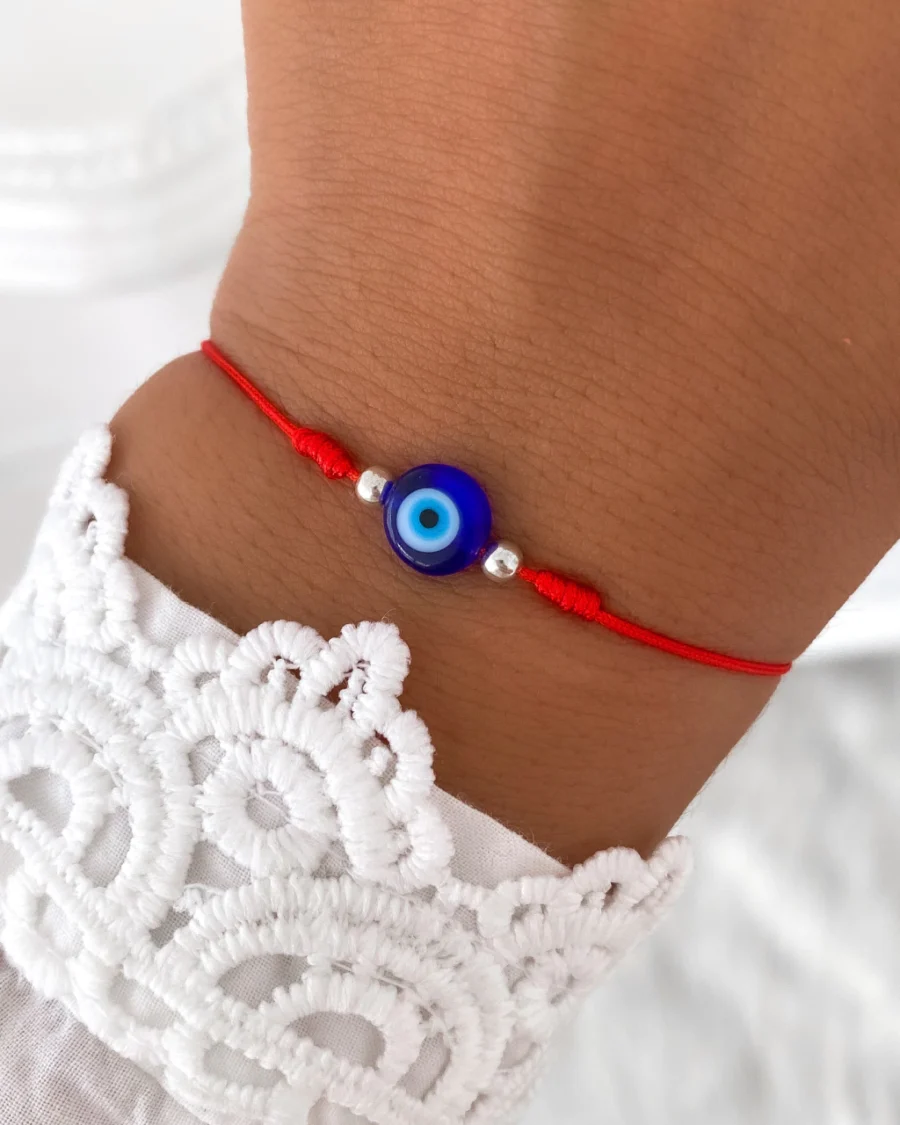 PUH01- PULSERA HILO ROJO CON OJO TURCO Y BOLITAS DE PLATA 925
