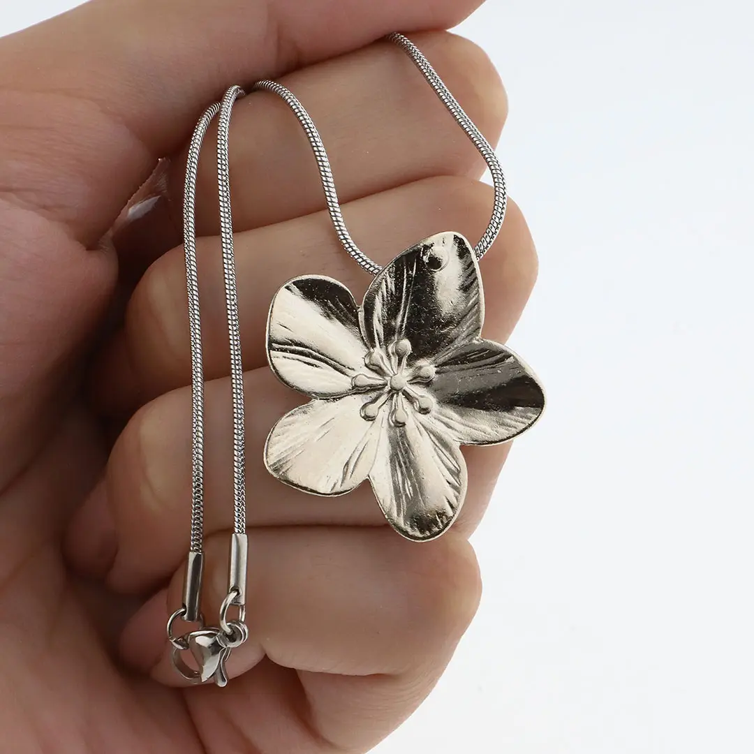 COLGANTE ACERO QUIRURGICO