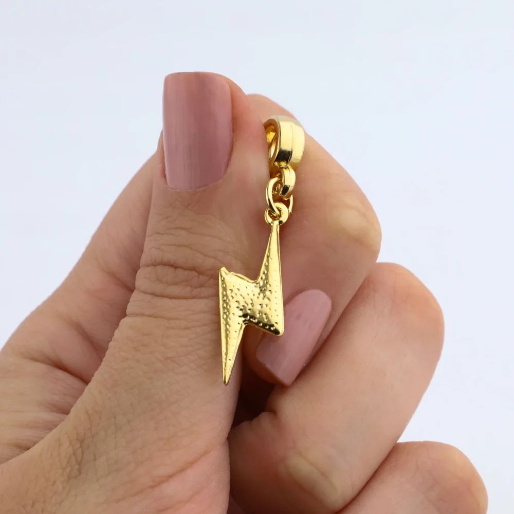 DIJE CHARMS ACERO DORADO