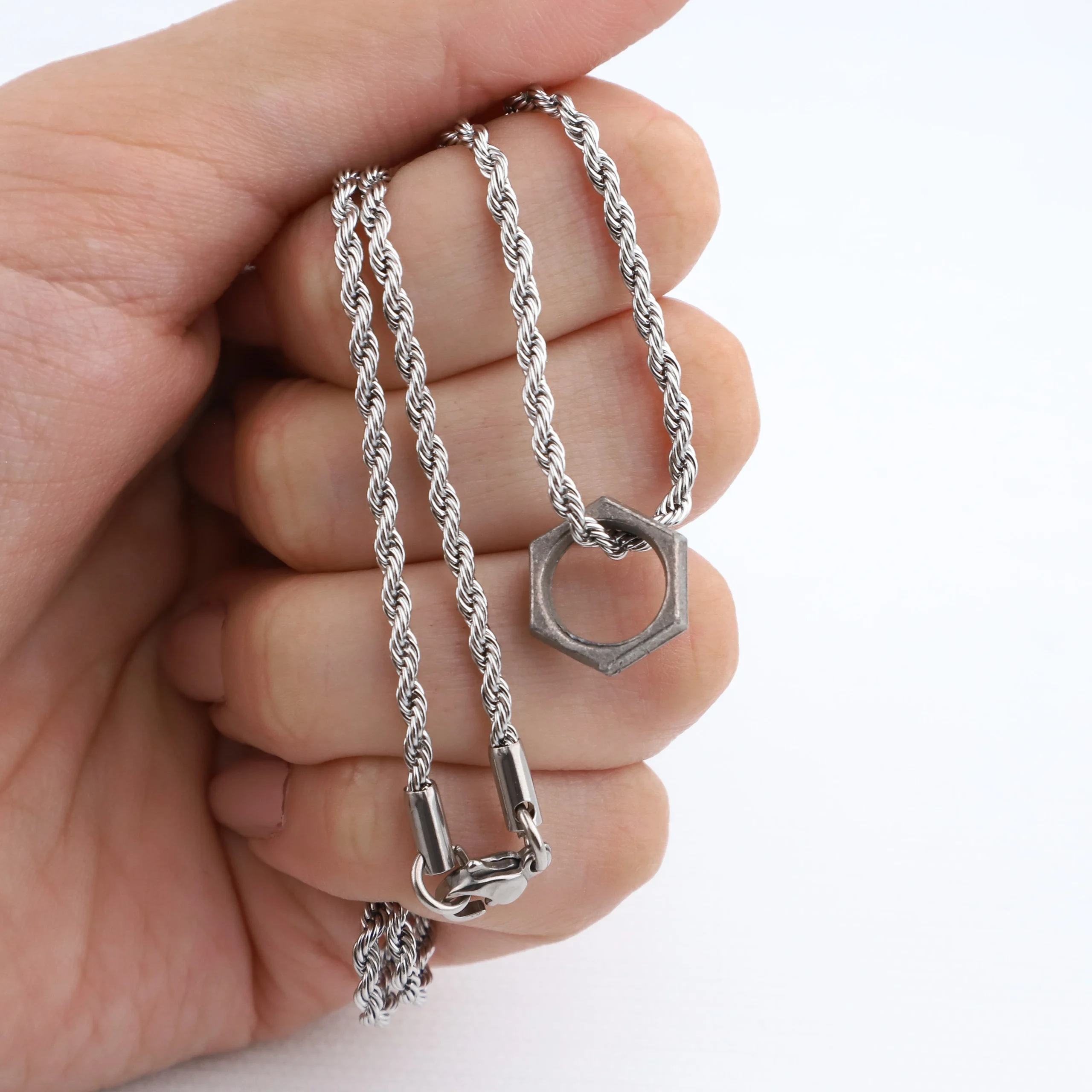 COLGANTE ACERO QUIRURGICO